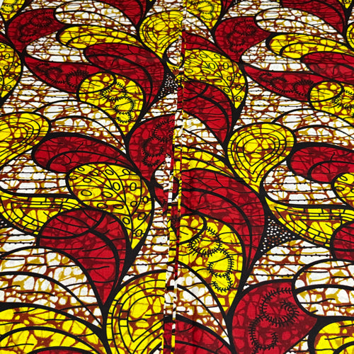Stained glass window with red and yellow leaf patterns