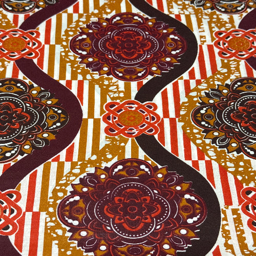 Patterned fabric with red, brown, and gold colors