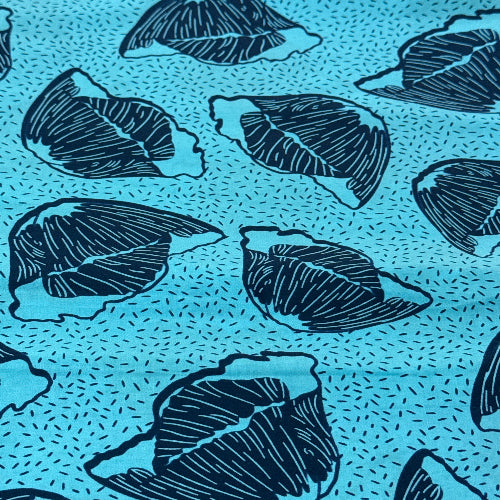 Pattern of blue leaf shapes on a blue background