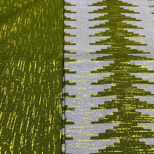 Close-up of a textured fabric with green and gray pattern