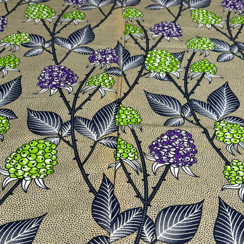 Floral pattern with green, purple, and black flowers on a beige background