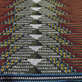 Close-up of a woven fabric with a multicolor pattern