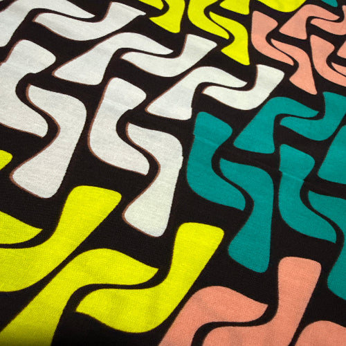 Colorful abstract pattern with wavy lines on a black background