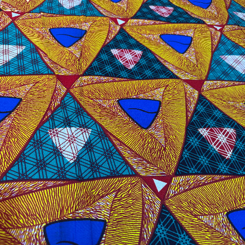 Geometric patterned fabric with blue, gold, and red colors