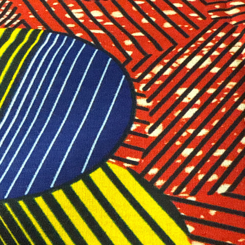 Abstract design with geometric shapes in red, blue, and yellow.