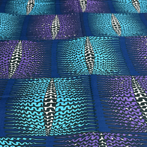 Patterned fabric with blue, purple, and black wavy lines and zigzag designs.