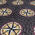 Pattern of compasses on a black background