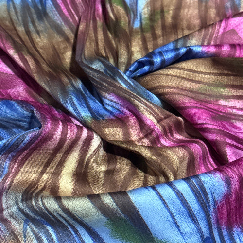 Multicolored fabric with purple, blue, and brown stripes.