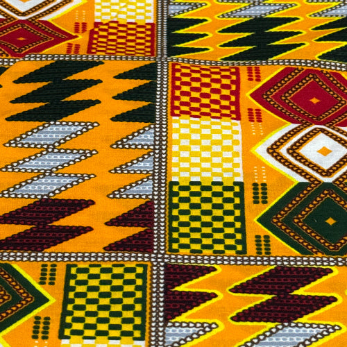 Patterned fabric with geometric designs in yellow, black, red, and white.