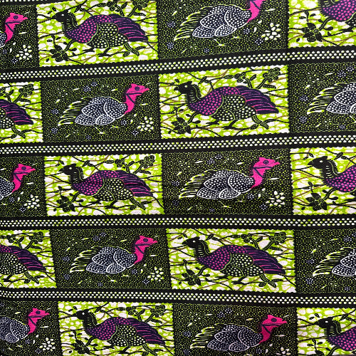 Patterned fabric with stylized birds and flowers on a black background