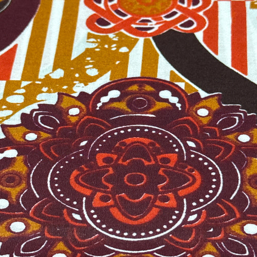 Close-up of a colorful fabric with a mandala pattern
