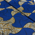 Patterned fabric with blue and gold geometric design
