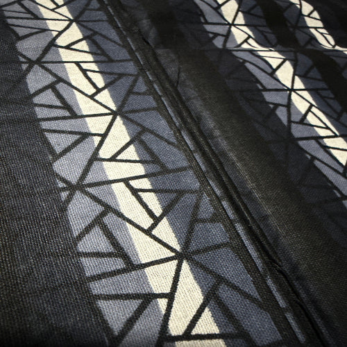Close-up of a textured fabric with geometric pattern