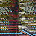Woven fabric with multicolor pattern on a black background
