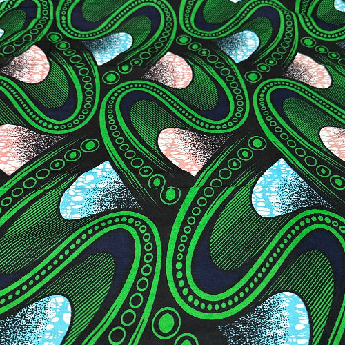 Close-up of a green and black abstract pattern with white and blue accents