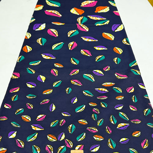 Colorful leaf pattern on a navy blue fabric