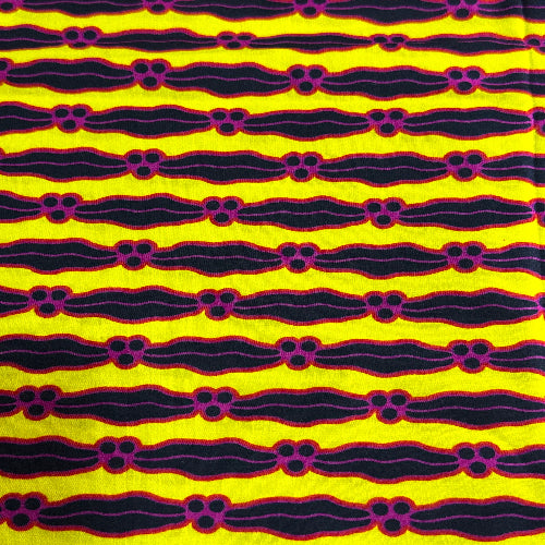 Patterned fabric with black wavy lines on a yellow background