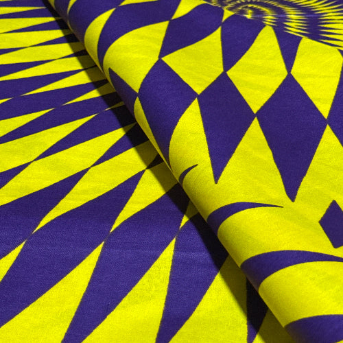Close-up of fabric with yellow and blue geometric pattern