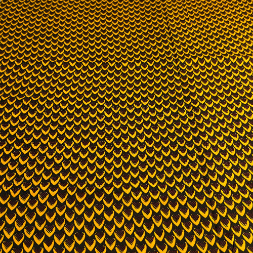 Close-up of a textured yellow and black pattern