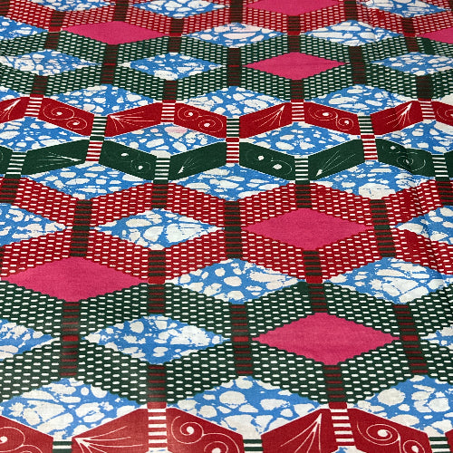 Colorful geometric patterned fabric with red, blue, green, and pink colors.