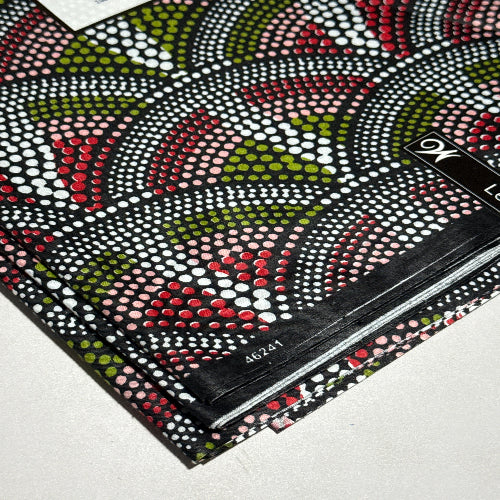 Decorative fabric with floral pattern and rhinestone embellishments on a white background