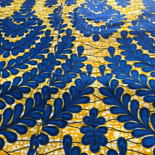 Pattern of blue leaves on a yellow background