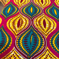 Colorful African print fabric with intricate patterns