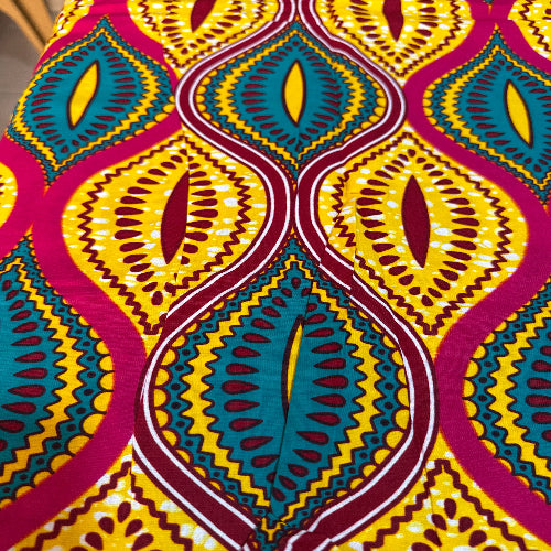 Colorful African print fabric with intricate patterns