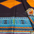 Colorful fabric with geometric patterns and embroidery on a black background