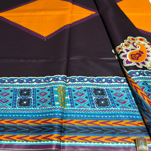 Colorful fabric with geometric patterns and embroidery on a black background
