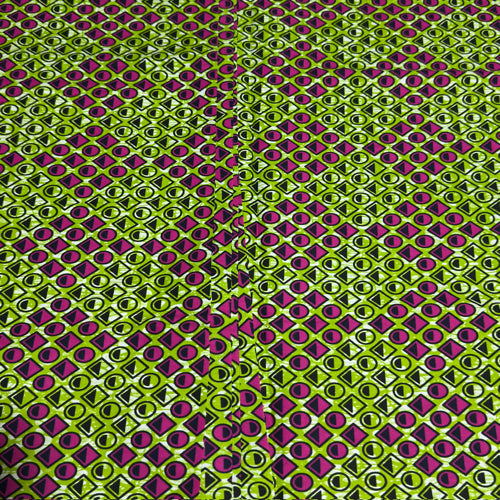 Patterned fabric with green and purple geometric design