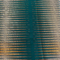Textured fabric with vertical gold and silver stripes on a teal background