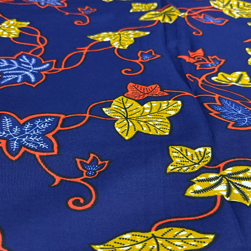 Colorful floral pattern on a blue fabric background