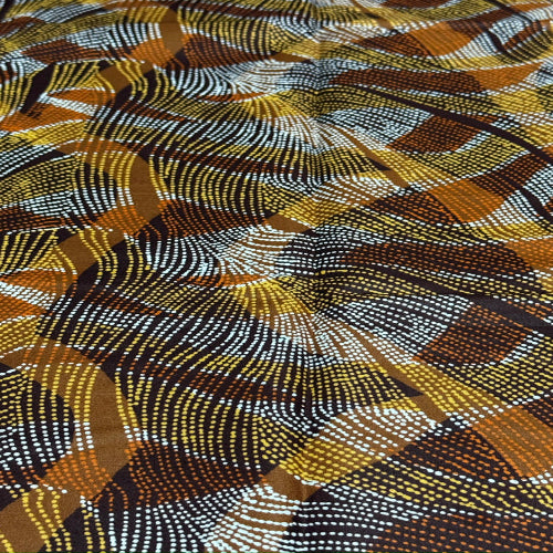 Patterned fabric with brown, yellow, and black colors