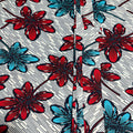 Floral pattern with red and blue flowers on a white background