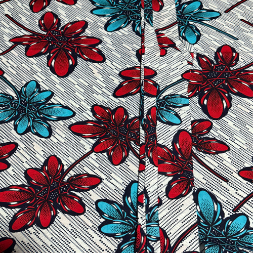 Floral pattern with red and blue flowers on a white background