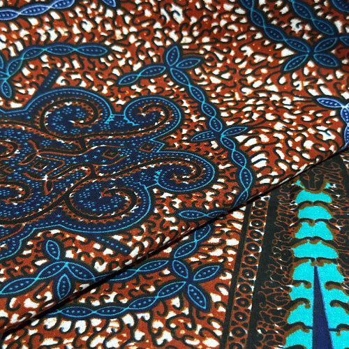 Close-up of intricate blue and brown patterned fabric