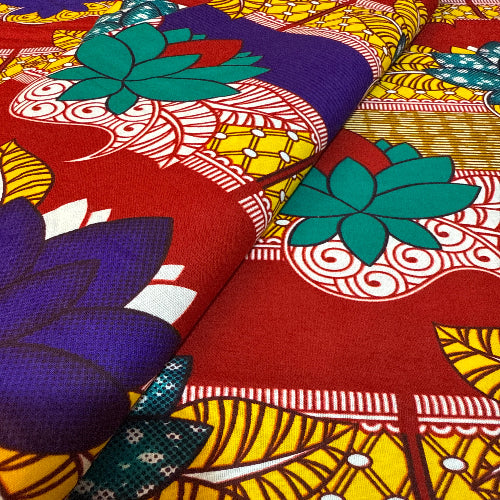 Close-up of colorful fabric with floral and abstract patterns