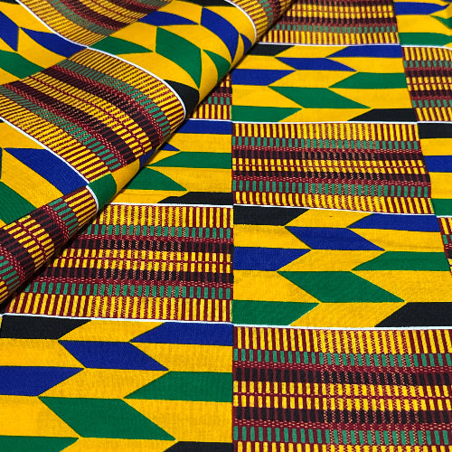 Colorful geometric patterned fabric with a mix of yellow, green, blue, and brown.