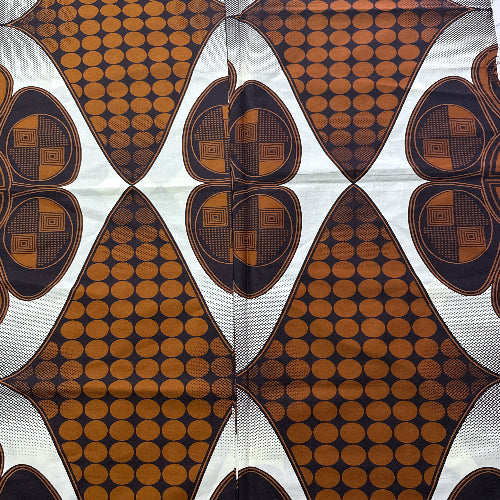 Patterned fabric with brown and black geometric design on a white background