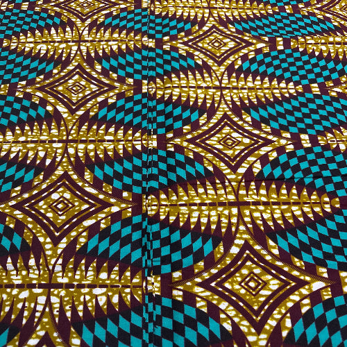 Close-up of a fabric with a geometric pattern featuring blue and gold colors.