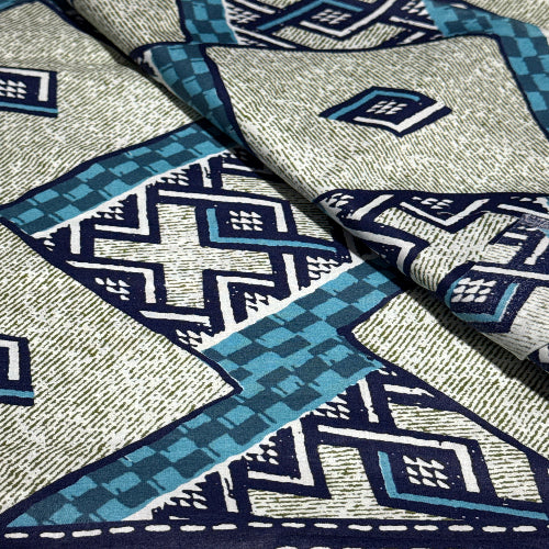Close-up of fabric with blue and gray geometric pattern