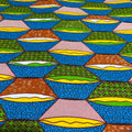 Colorful geometric patterned fabric with blue background