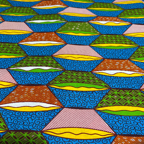 Colorful geometric patterned fabric with blue background