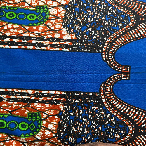 Close-up of a vibrant fabric with intricate patterns and bright colors