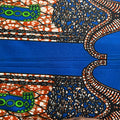 Close-up of a vibrant fabric with intricate patterns and bright colors