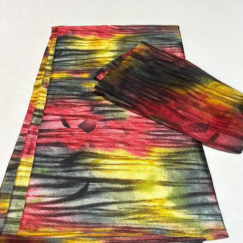 Colorful abstract patterned fabric on a white background