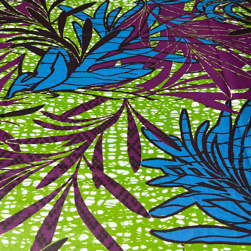 Tropical leaf pattern with blue and purple leaves on a green background