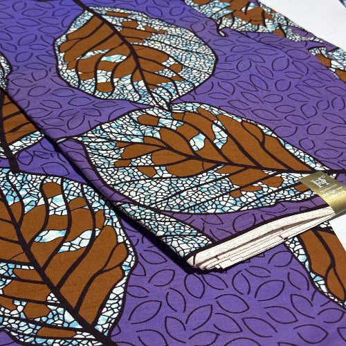 Close-up of fabric with purple and brown leaf pattern