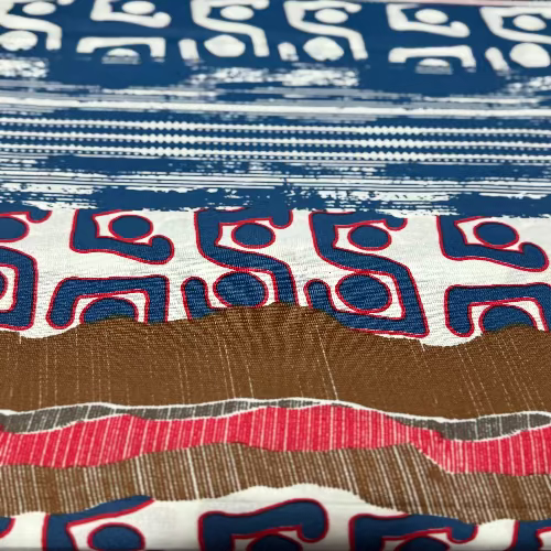 Close-up of fabric with blue, white, and red geometric pattern